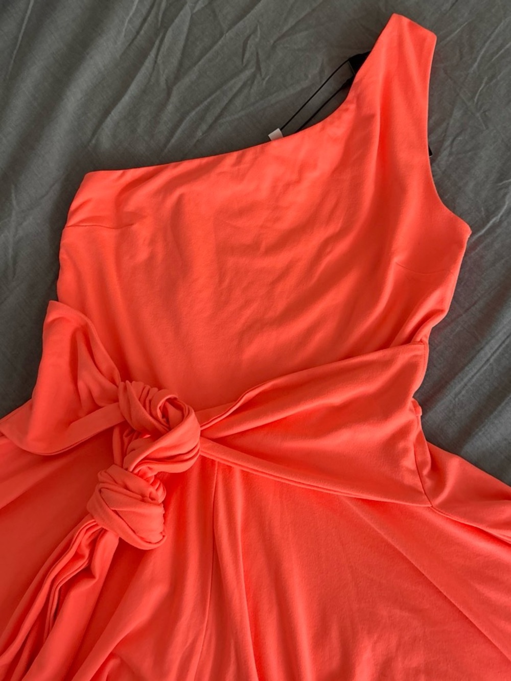 One-Shoulder Coral Romper with Twist Waist Detail